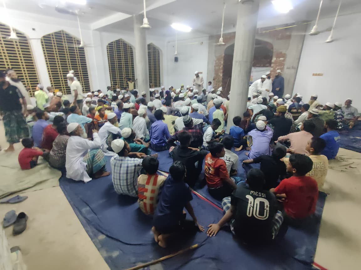 Attendees of the commemoration program at the mosque
